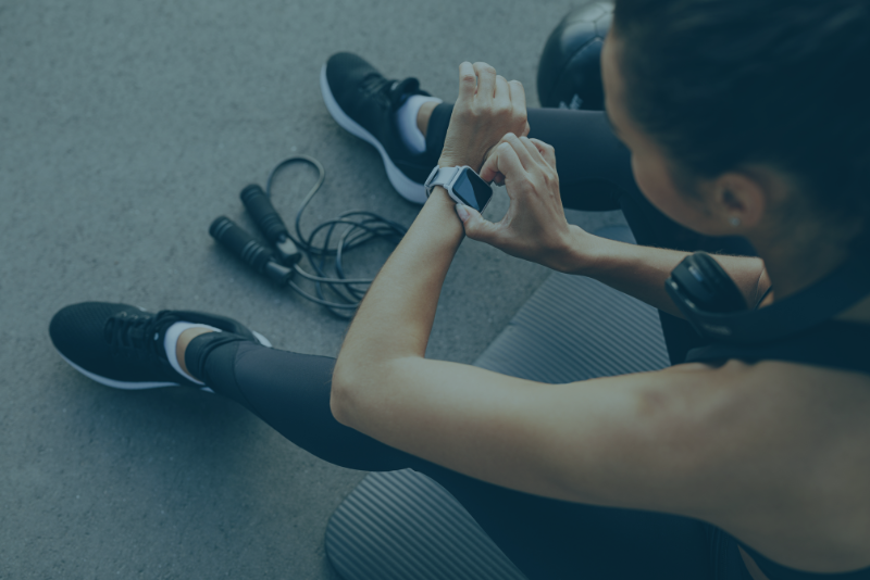 Website - Woman in Gym (BlueOverlay)