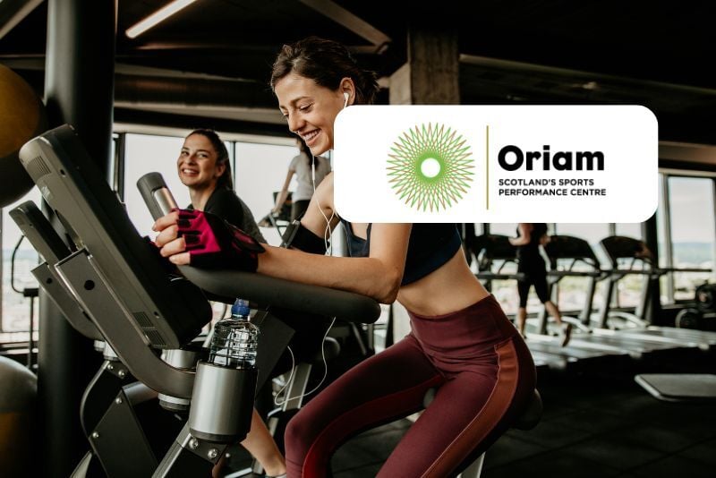 Woman on cycle in gym